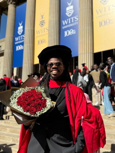 Kenneth Rapetsoa in front of the Great Hall on his graduation day 8 July 2024.